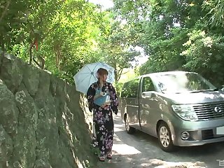 Kimono girl in a van sucks dick and gets toy fucked
